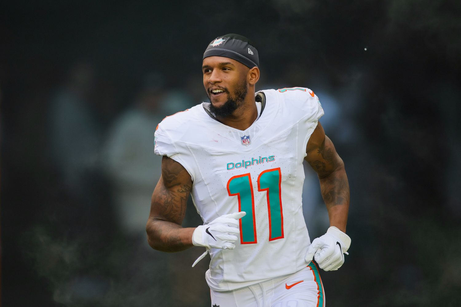 Miami Dolphins wide receiver Cedrick Wilson Jr. (11) enters the field to take on the New York Jets.